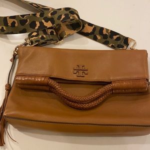 Tory Burch crossbody clutch. Fold over design. Braided handle. Tan Camel